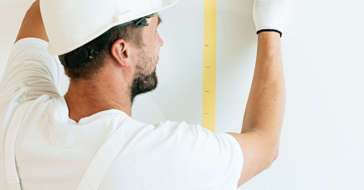 Man in White Chef Uniform Holding White Ruler · Free Stock Photo