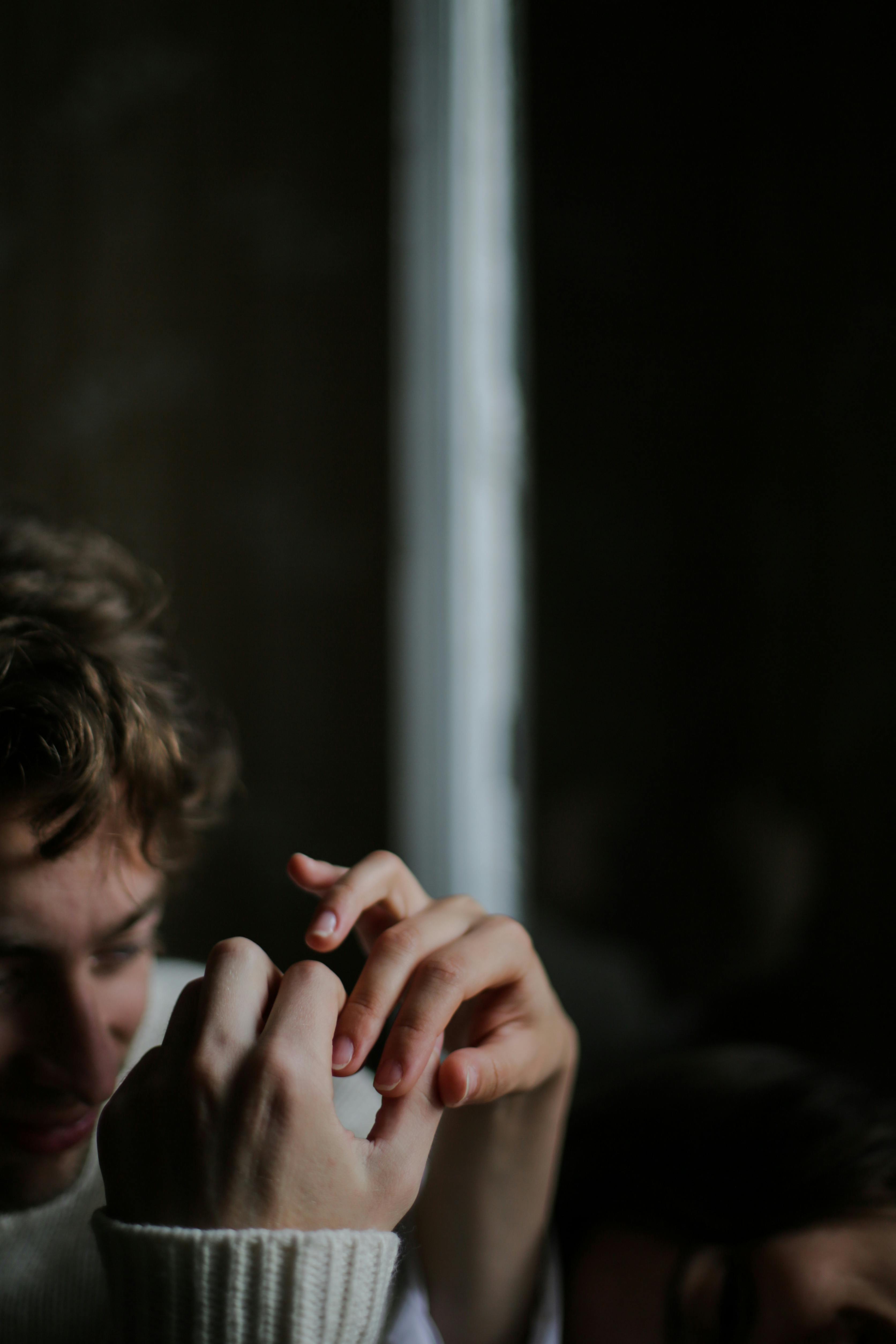 Persons Left Hand On Window · Free Stock Photo