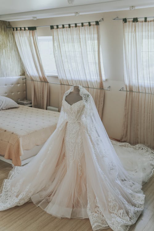 Beautiful white wedding dress on mannequin