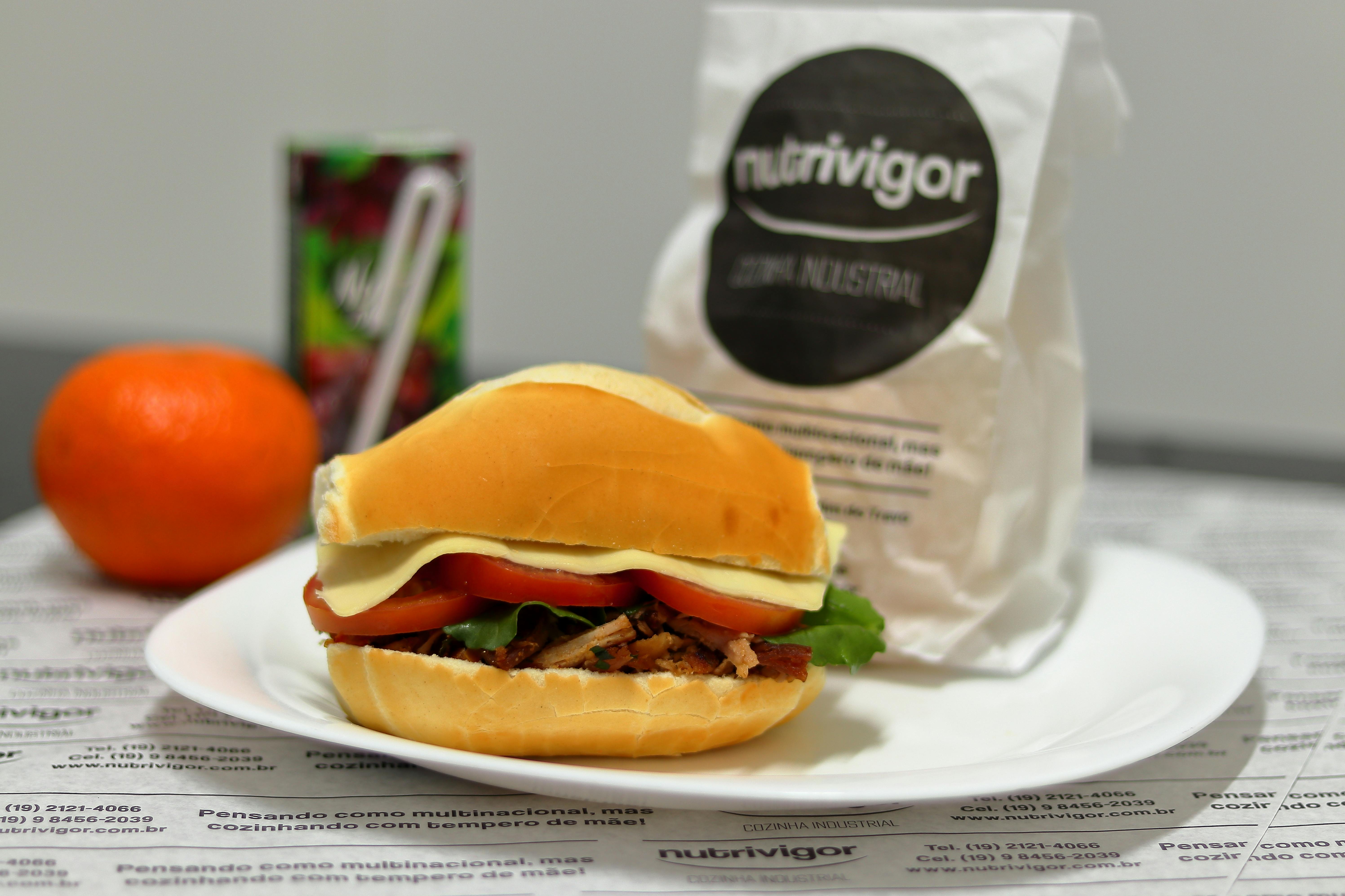 burger on white ceramic plate