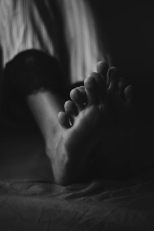 Free Black and white close-up of feet, artistic and intimate composition. Stock Photo