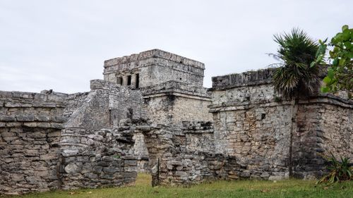 Free Explore the historic ancient ruins of Tulum, Mexico, showcasing Mayan architecture against a tropical backdrop. Stock Photo