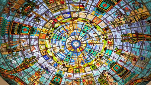 Free Colorful stained glass ceiling at Kukulcan Plaza, Cancún, showcasing local artistry. Stock Photo