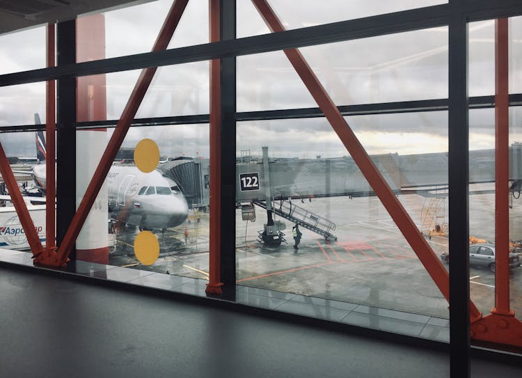 Airplane And Jet Bridge