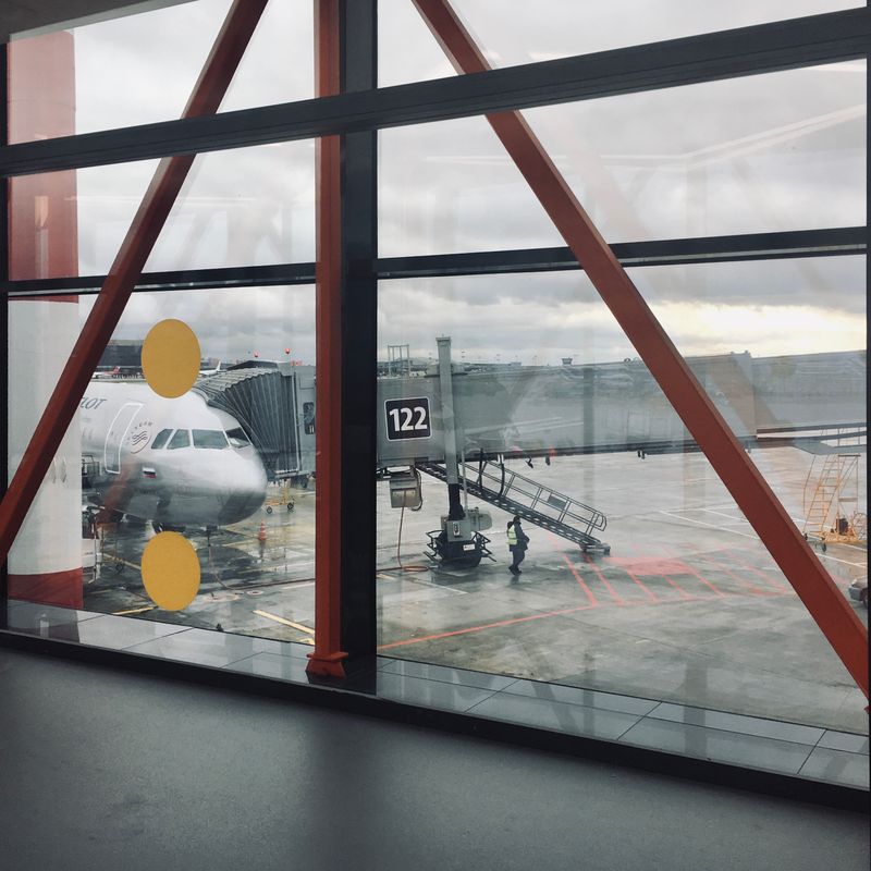 Airplane at jet bridge