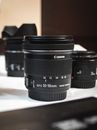 Black Camera Lens on White Table