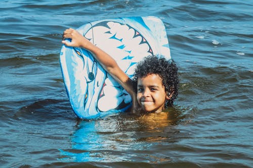 A Young Boy Swimming in the Sea