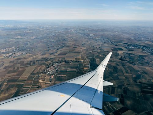 Free Scenic aerial view of the fields near Frankfurt, Germany, as seen from an airplane window. Stock Photo