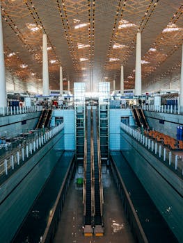 Grand view of the architecture and interior design at Beijing Capital International Airport.