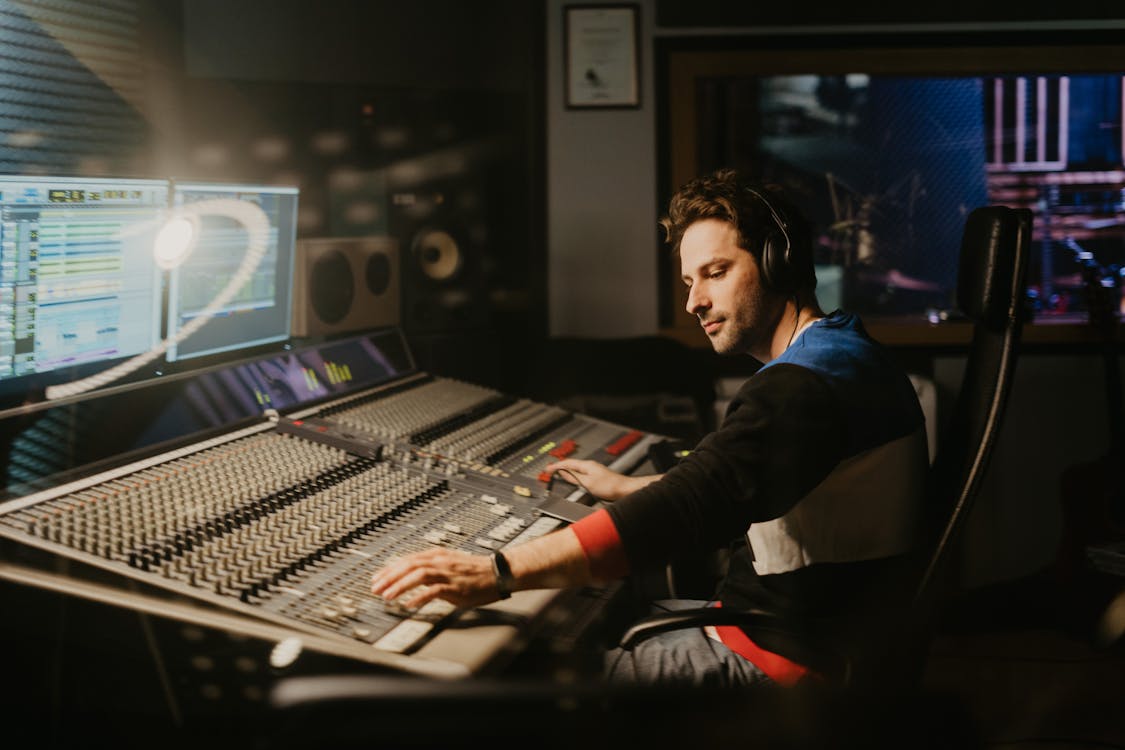 Free A Man in Control of the Recording Studio Stock Photo