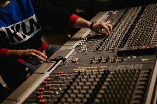 Free A Sound Engineer on the Control Panel of a Recording Studio Stock Photo