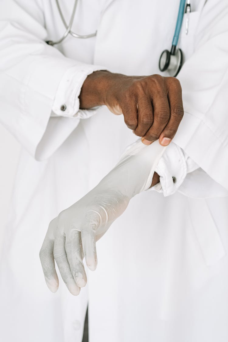 A Doctor Wearing A Glove