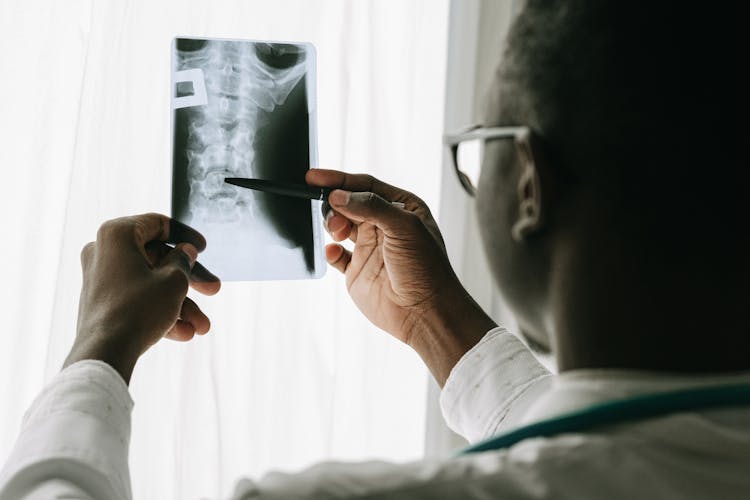 A Doctor Looking At An X-ray