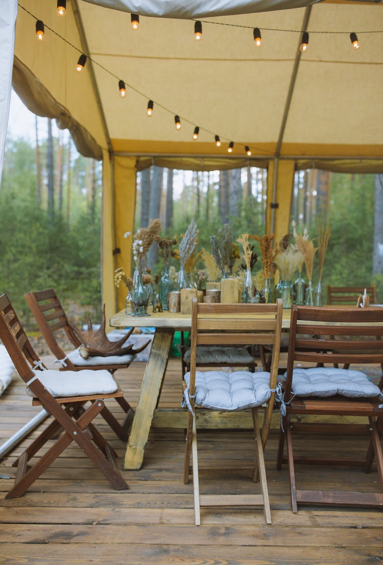 Table And Chairs Under A Tent