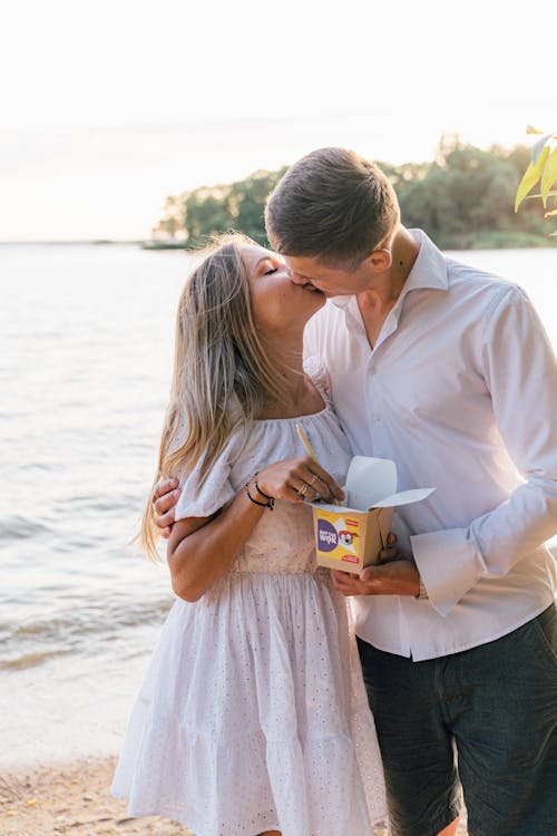 Free Man and Woman Kissing Stock Photo