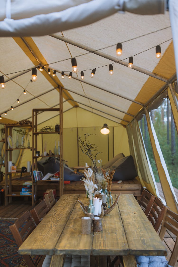 A Dining Table Inside A Tent