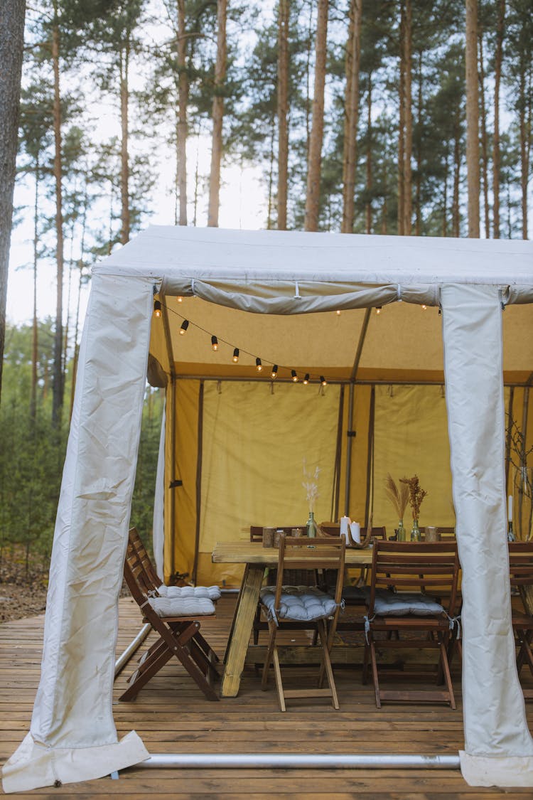 A Dining Table Inside A Tent