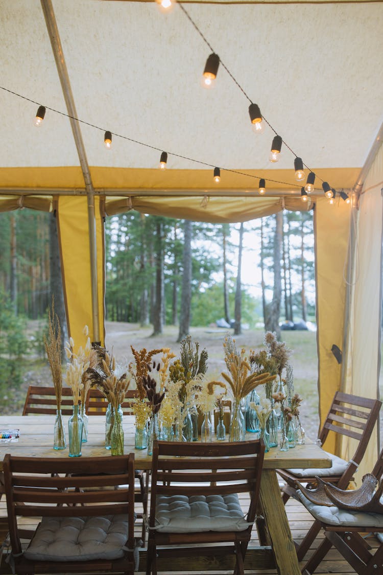 A Dining Table Inside A Tent