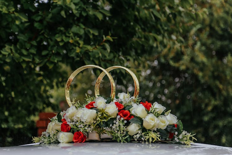 Elegant Wedding Decorations On White Car