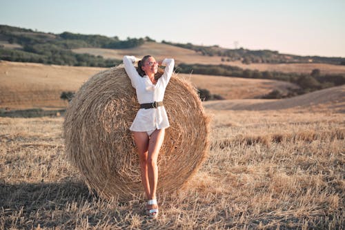 Beautiful Woman Posing with Hay