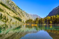 Tranquil Photo of Mountains Reflecting in Lake Waters