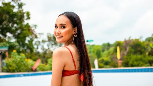 Woman in Red Bikini Looking Back at the Camera