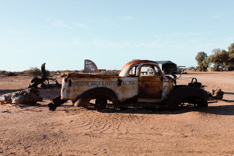 Old Rusty Transport In Desert Under Blue Sky