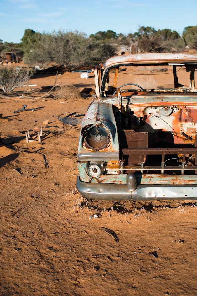 Rusty Car Abandoned In Desert