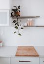 Interior of light kitchen in modern apartment