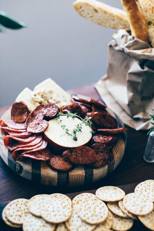 Tasty meat sausage slice set and bread placed on table