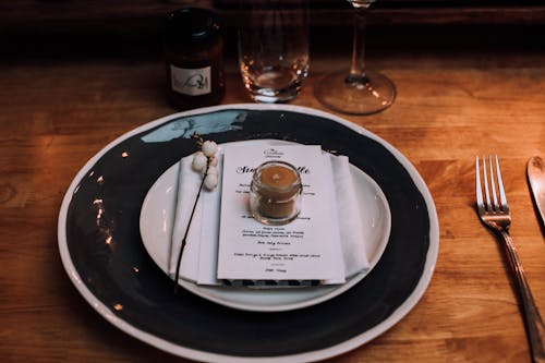 Natural table setting on wooden table for festive dinner