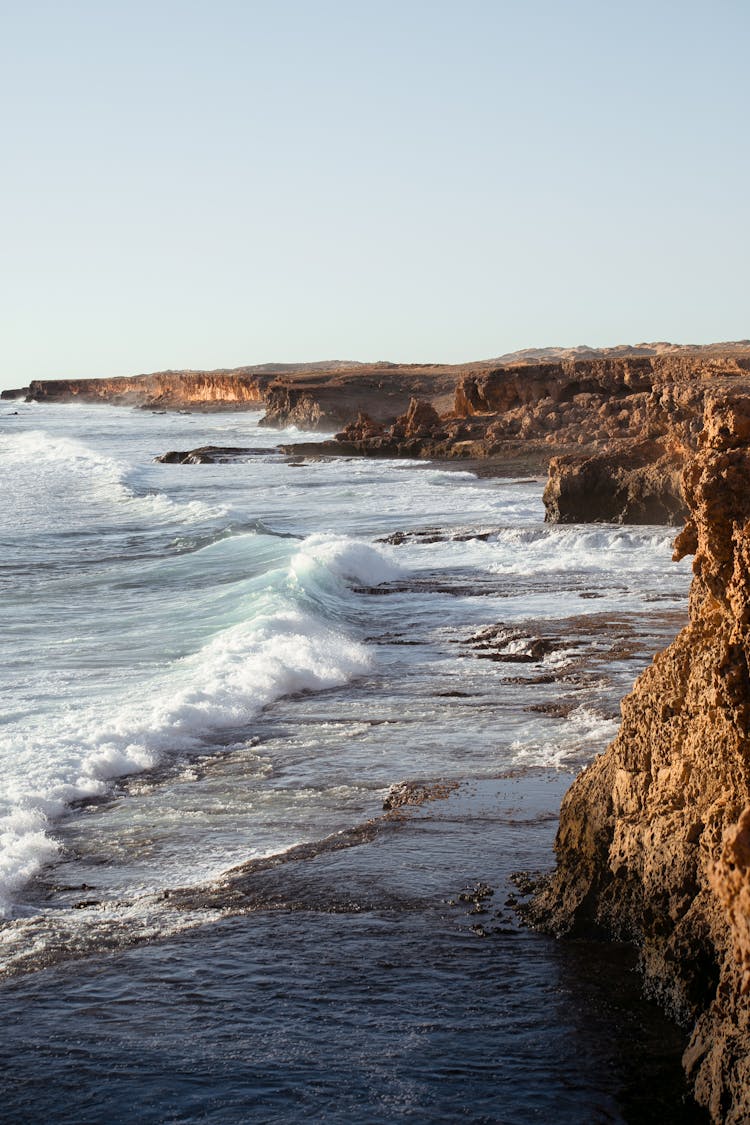 Waving Sea Splashing Near Stony Shore