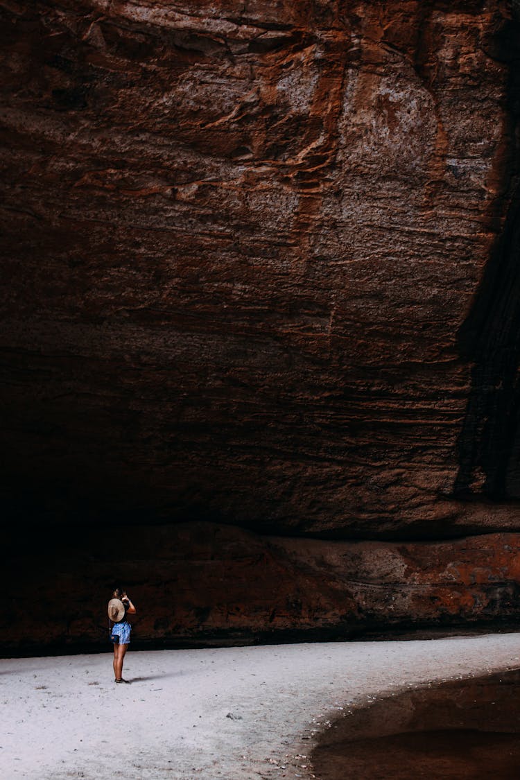 Anonymous Woman Exploring Rocky Canyon During Trip In Australia