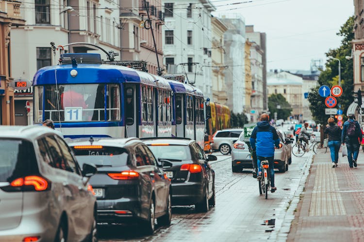 Tram And Cars In Traffic Jam At Rush Hour