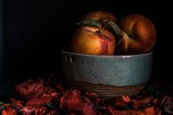 Red Apples on Gray Round Container