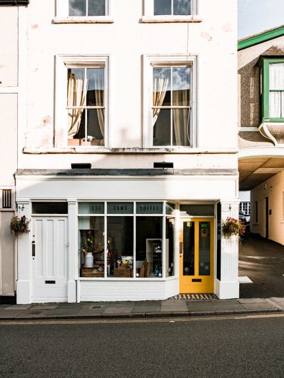 Street-facing café premises with windows and an entrance