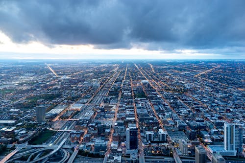 Aerial Photography of a Busy City Under Cloudy Sky