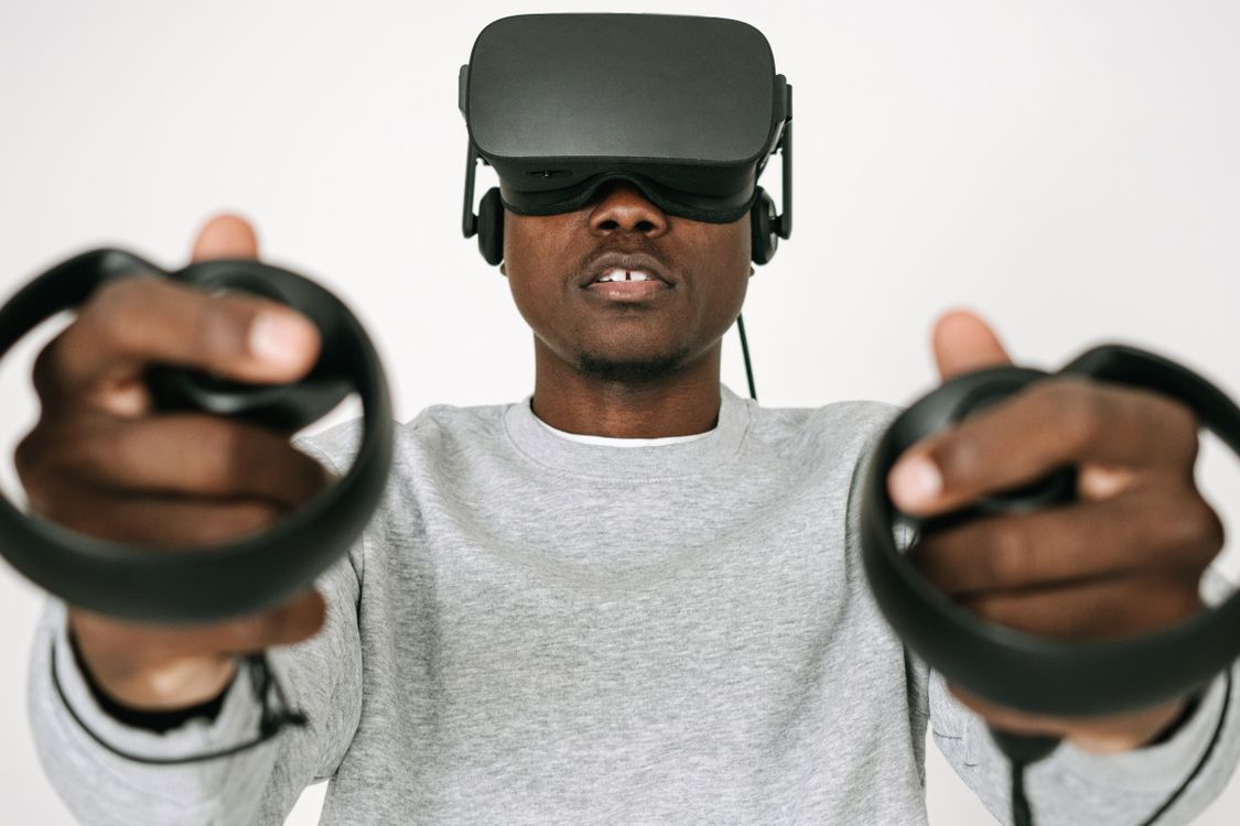 A Man Playing on the Controller He is Holding · Free Stock Photo