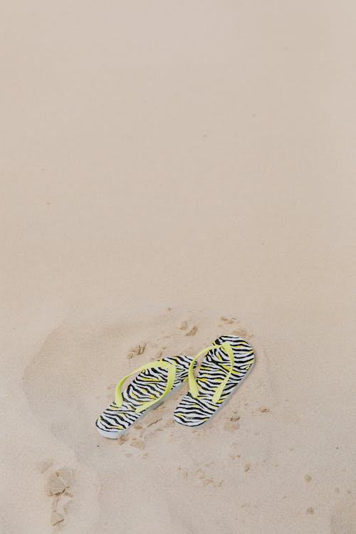 Flip Flops on a Sandy Shore