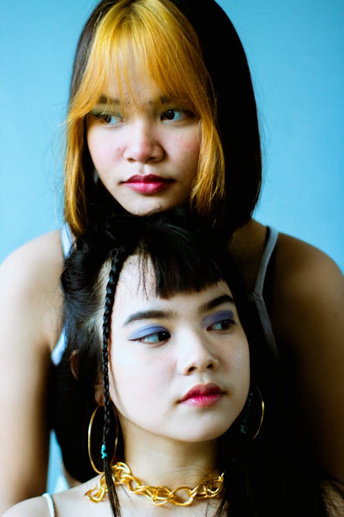 Two Girls Wearing Makeup