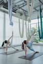 Women Practising Yoga on Mats