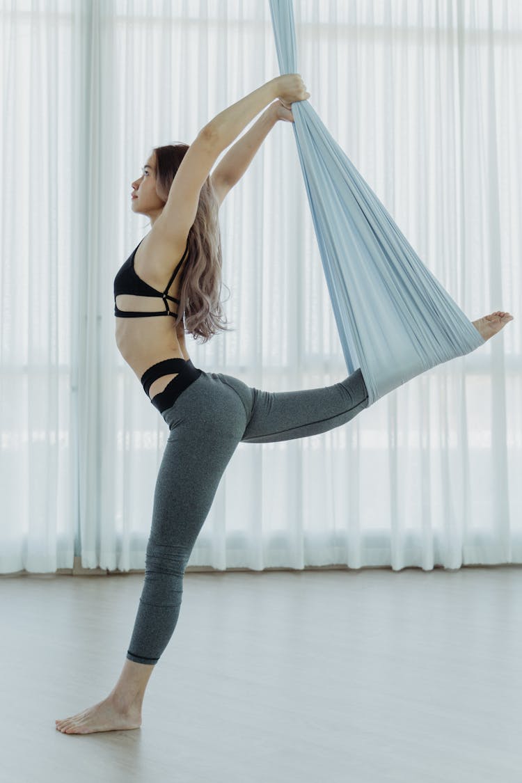 Woman Doing Aerial Yoga