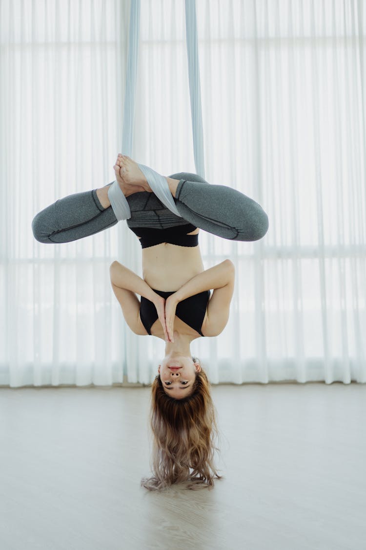 Woman Doing Aerial Yoga