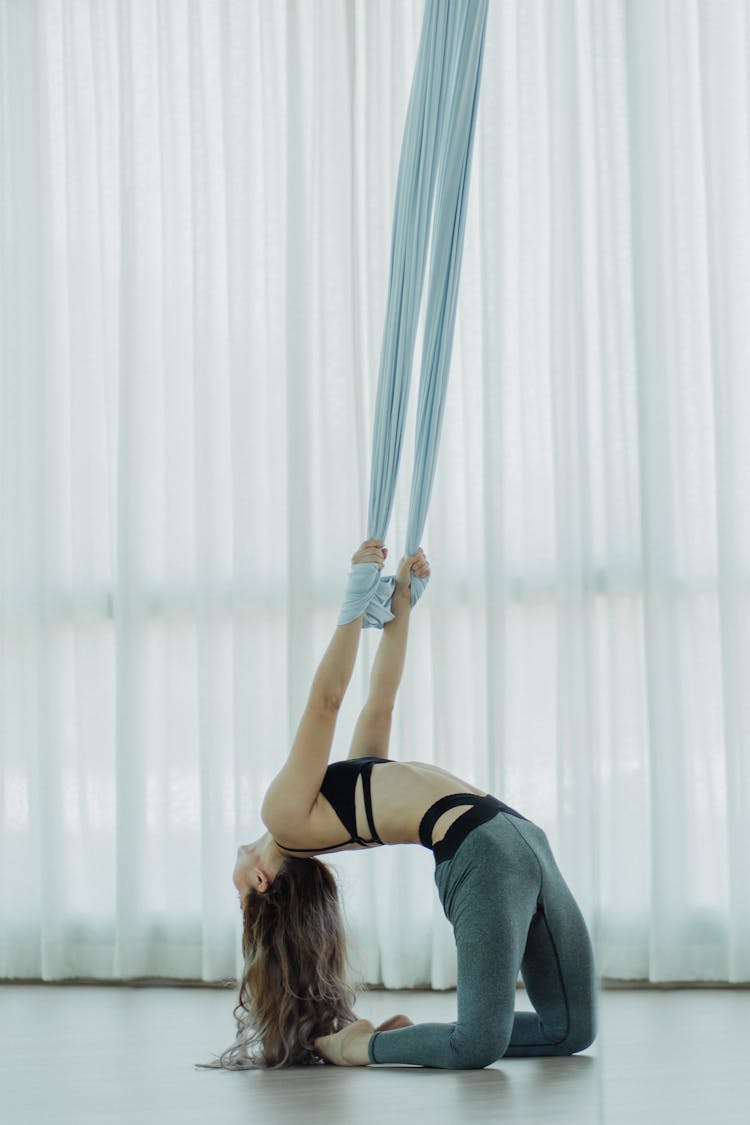 Girl Performing Exercise On Canvases