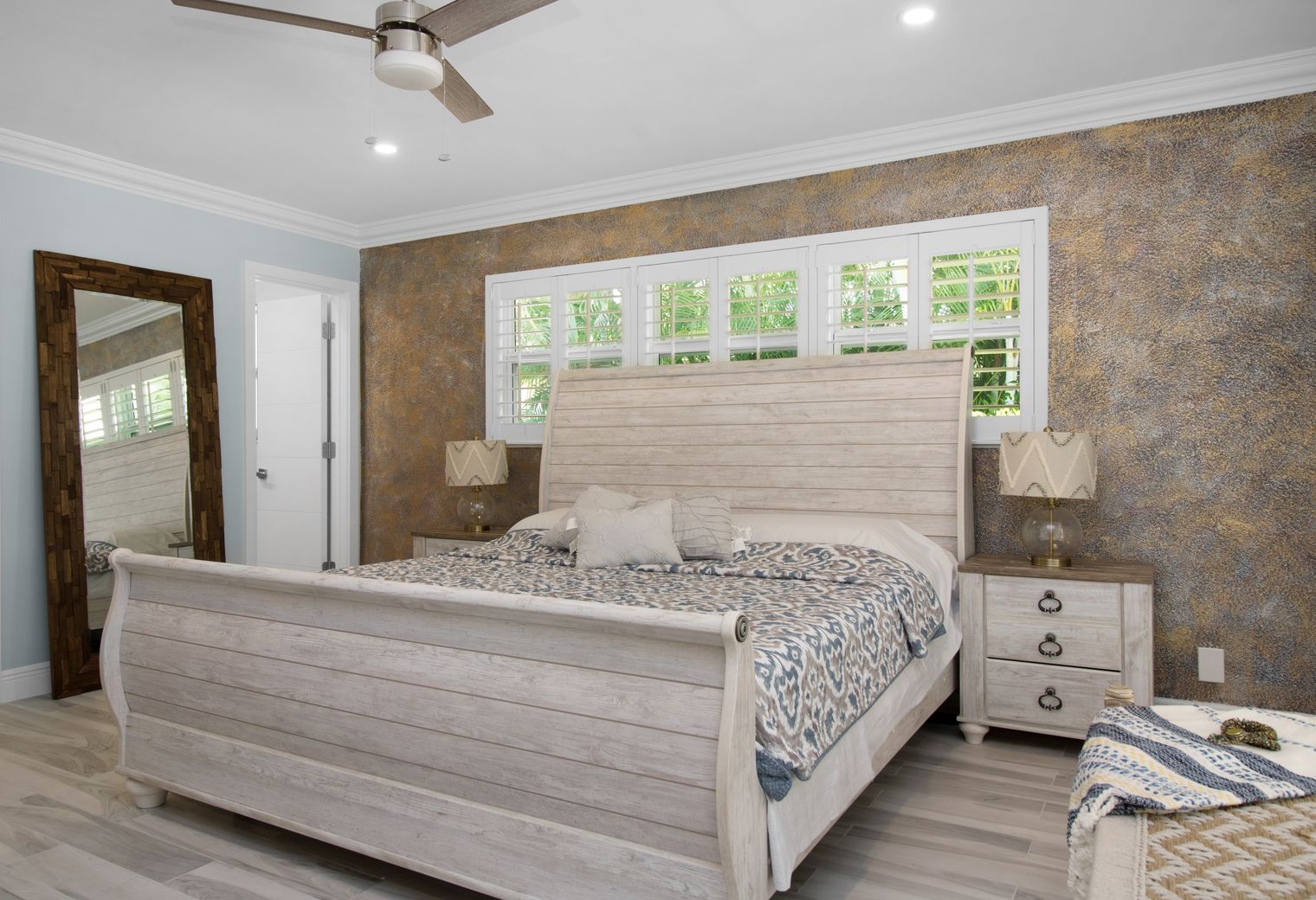 Wallpapering in Angel — dust sheets down and the room fully protected