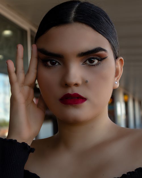 Pretty Woman with Makeup Looking at Camera