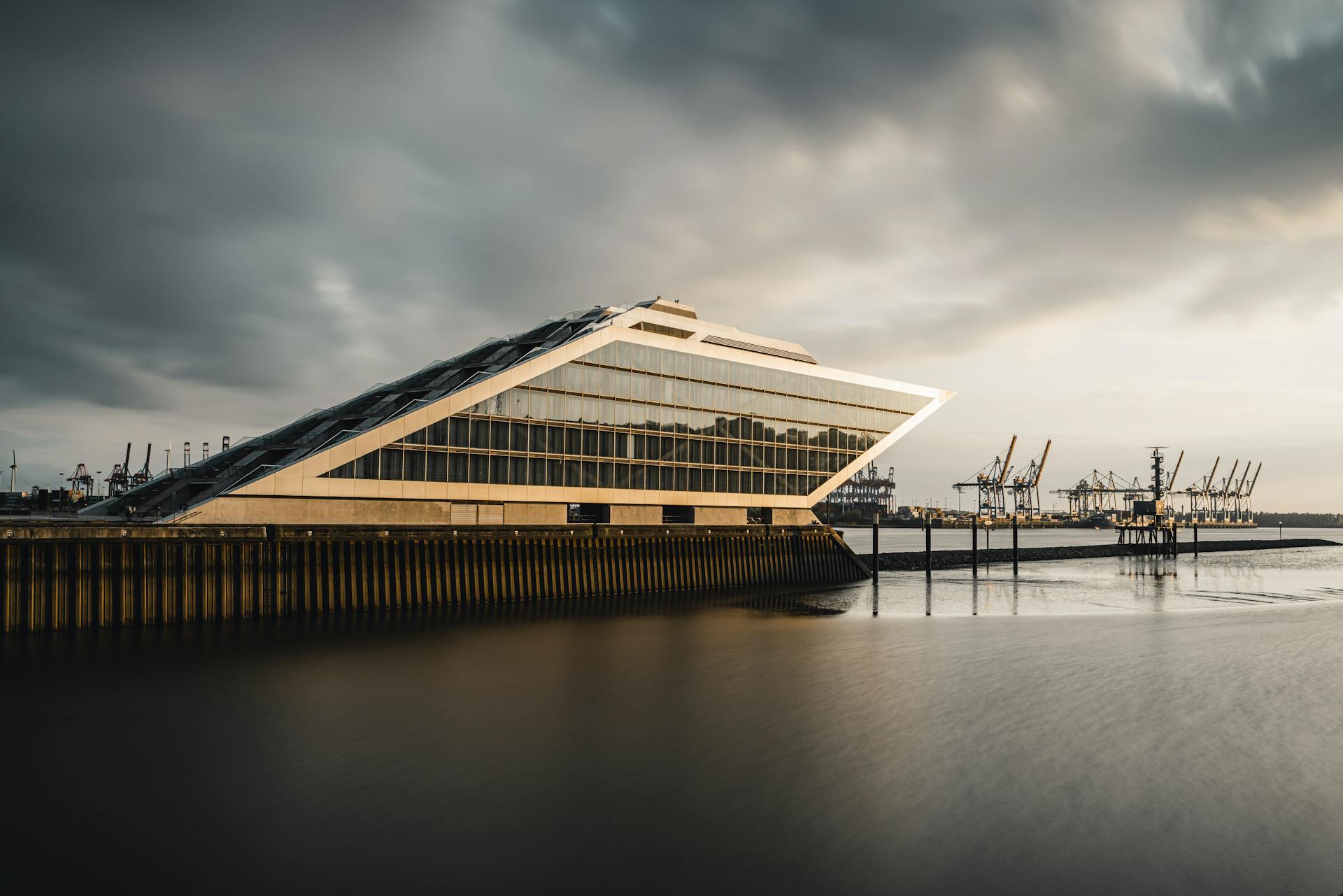 Explore the modern architectural wonder of Hamburg's Dockland building at sunset.