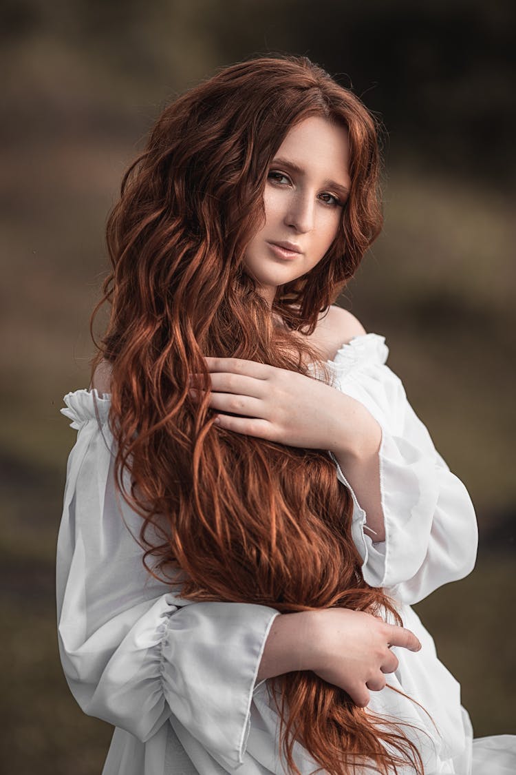 Young Sensual Woman In White Dress