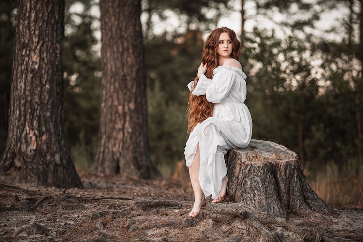 Young Woman In Forest In Daylight