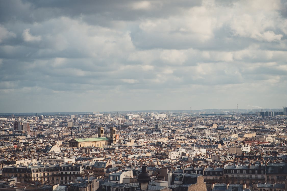 Aerial Photography of City Buildings under the Cloudy Sky